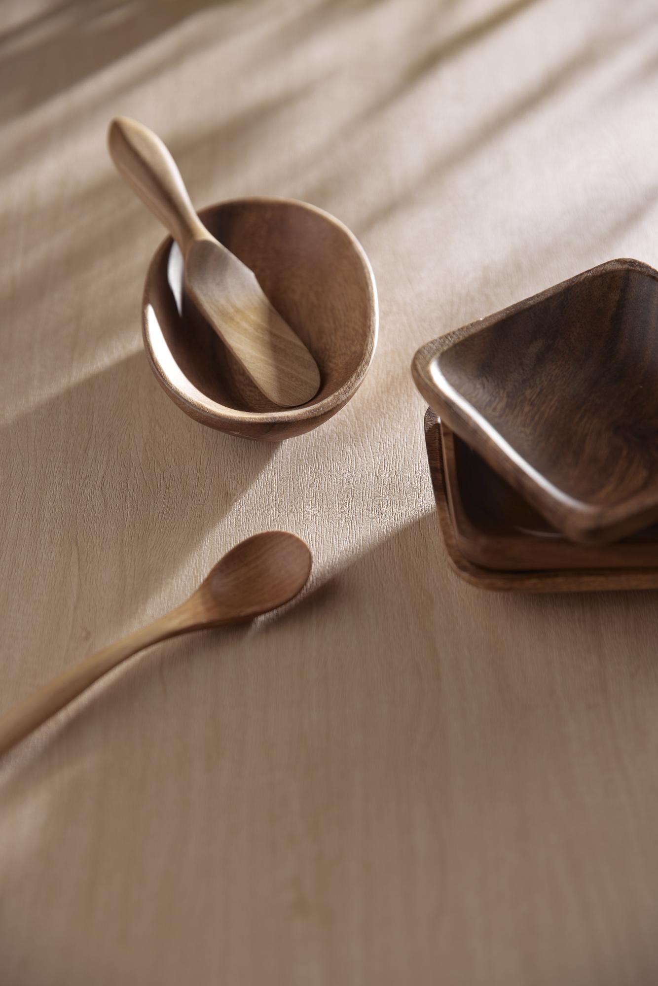 Artisan kitchen workspace with utensils and linen
